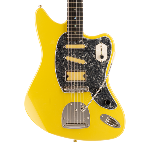 Front body detail of the yellow Lewis Guitarworks Amigo Del Surf with pickups and offset vibrato