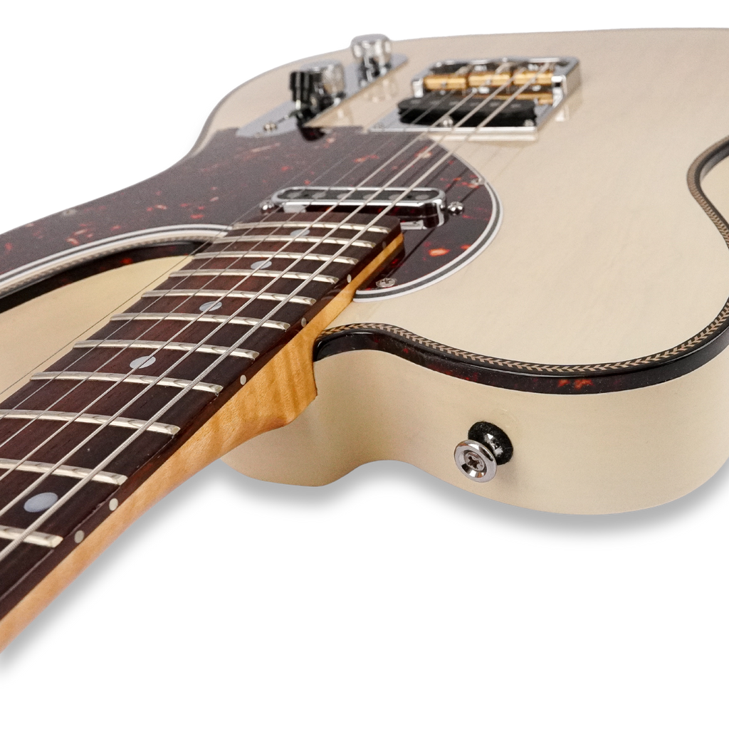 Close-up of the natural-finish Lewis Guitarworks Tañido body, pickups and bound neck